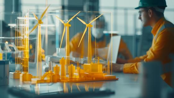 Engineers discussing design of wind turbines