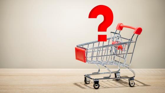 Question mark above shopping trolley