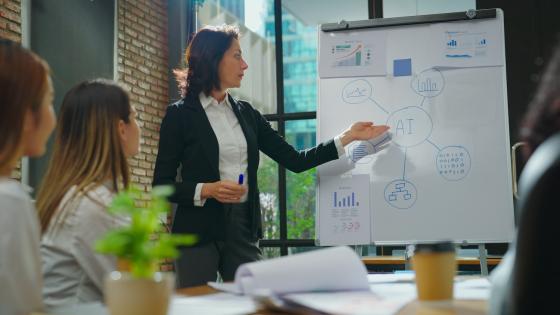 Woman making a presentation about AI at work